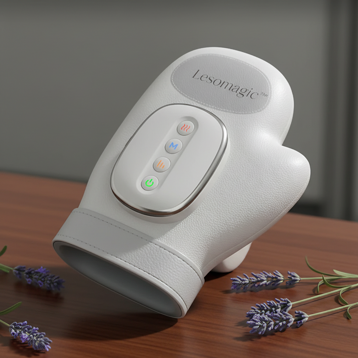 White LeSomagic WristSpa hand massager with four control buttons